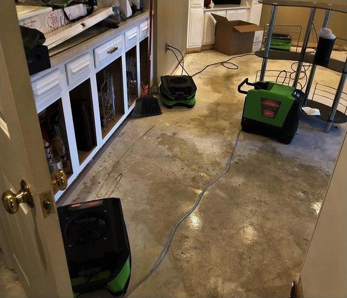Water has damaged flooring in basement 