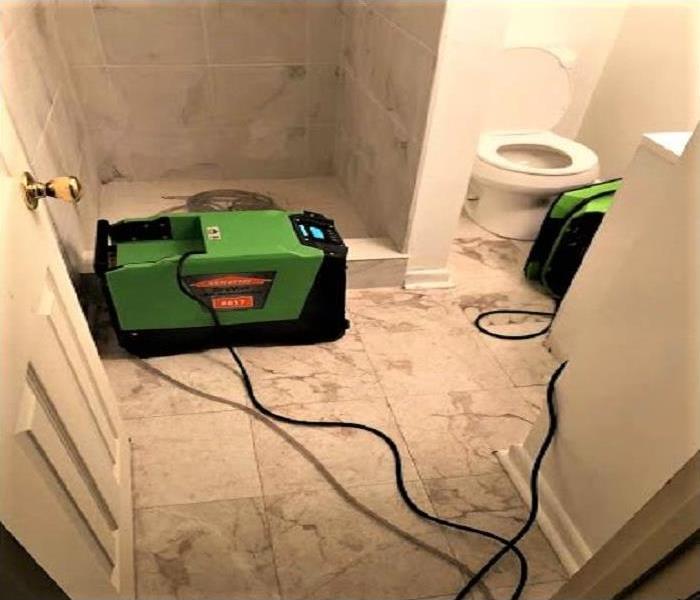 Sewage cleaned up from basement bathroom